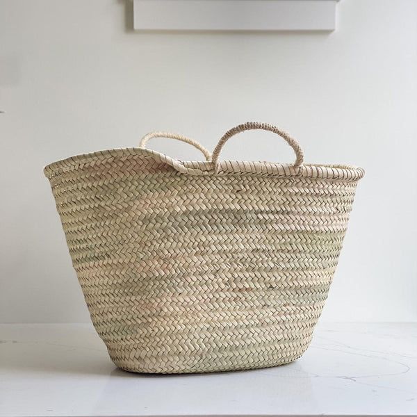 Handwoven from sustainable palm leaves and with natural sisal cord handles, perfect for markets, foraging, and everyday use. Ethically handmade in Morocco using traditional techniques, age beautifully with time and use.
