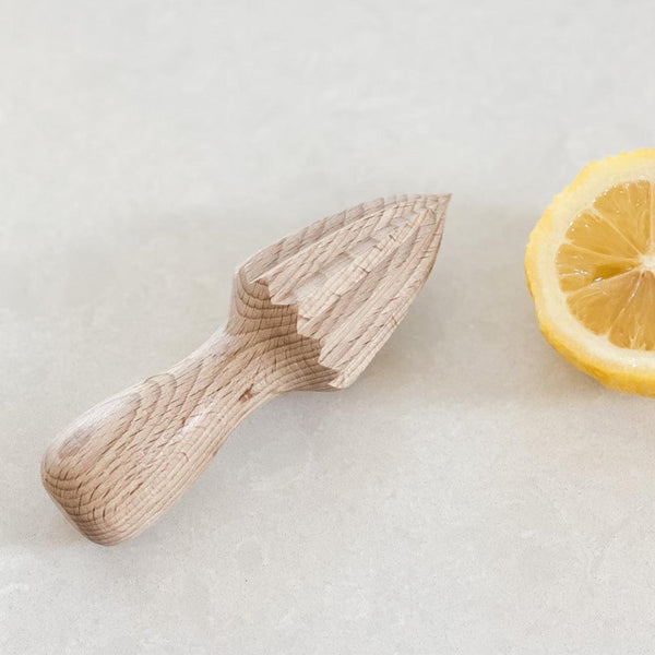 Redecker handheld wooden citrus juicer